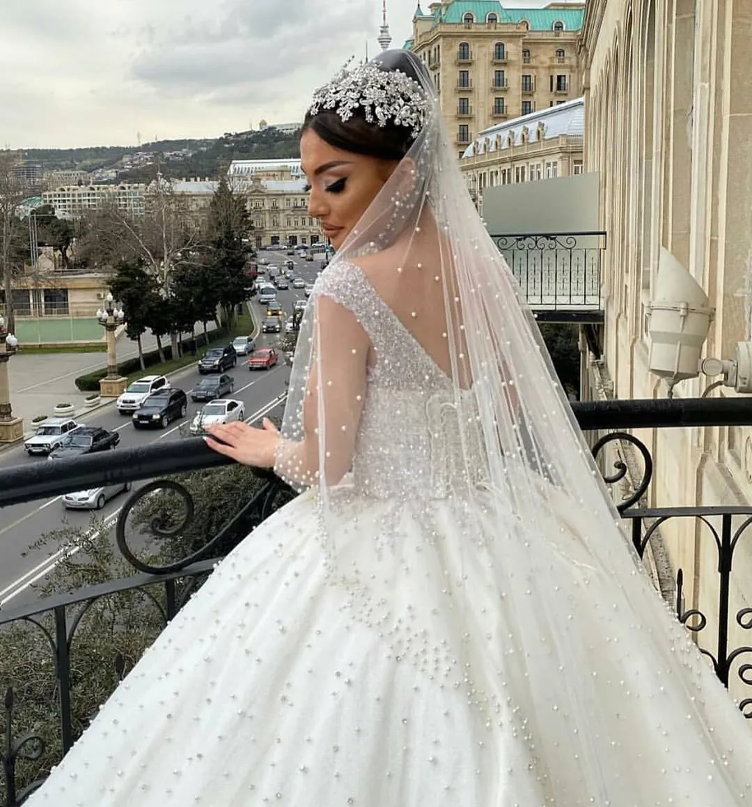 Sweetheart Off-the-Shoulder Backless Ball Gown Wedding Dress with Pearl Beading and Ruffles